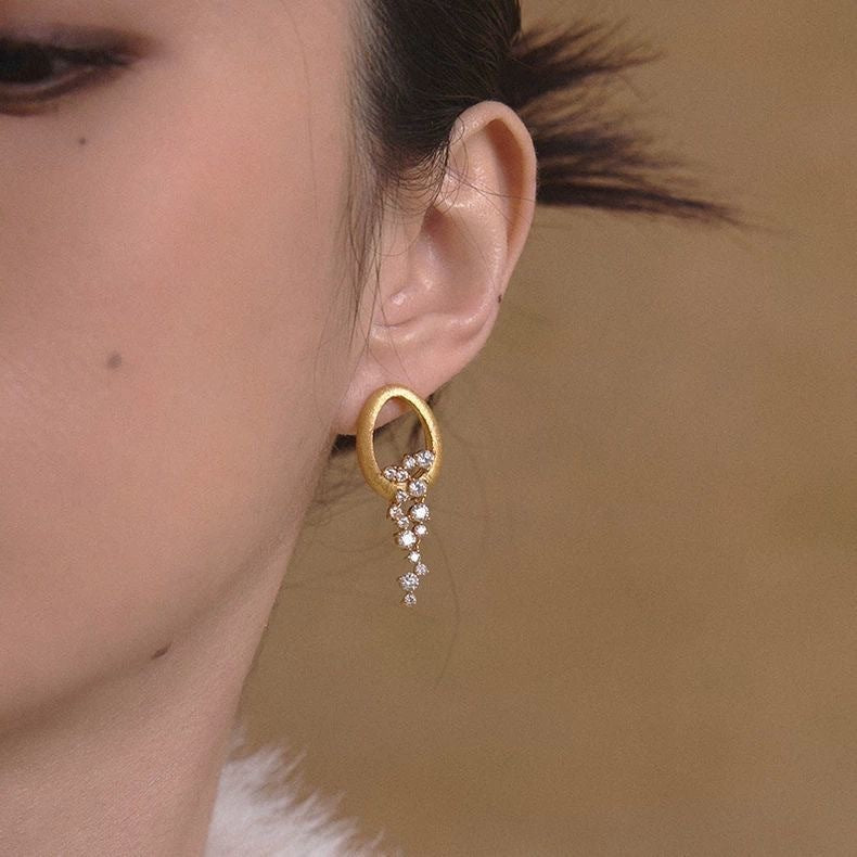 Earrings With Zircon Inlaid Design Exuding A Lively Charm