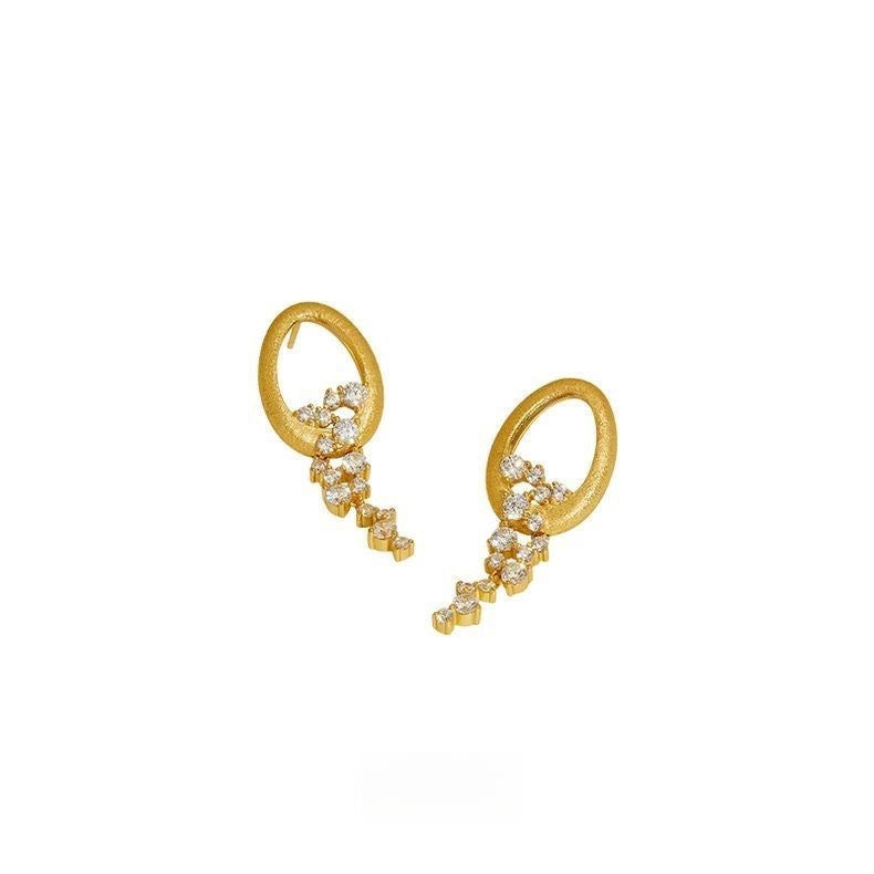 Earrings With Zircon Inlaid Design Exuding A Lively Charm