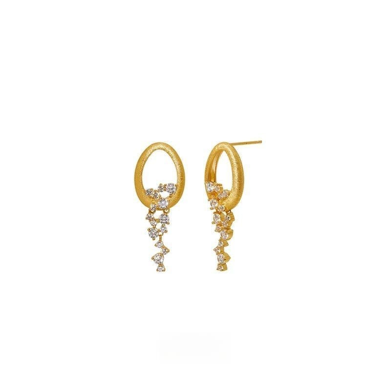 Earrings With Zircon Inlaid Design Exuding A Lively Charm